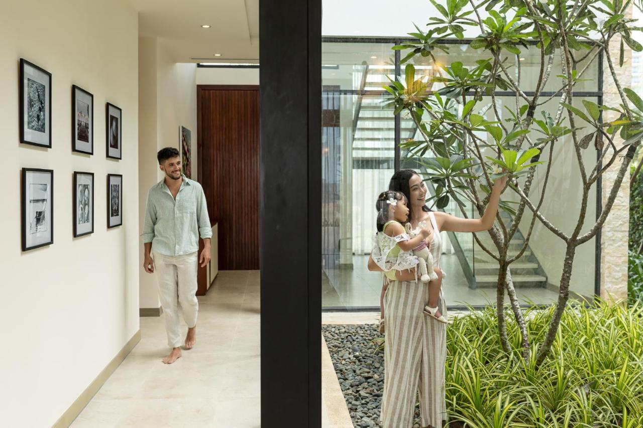 Melia Ho Tram Beach Resort Экстерьер фото A family at their home in Hyderabad